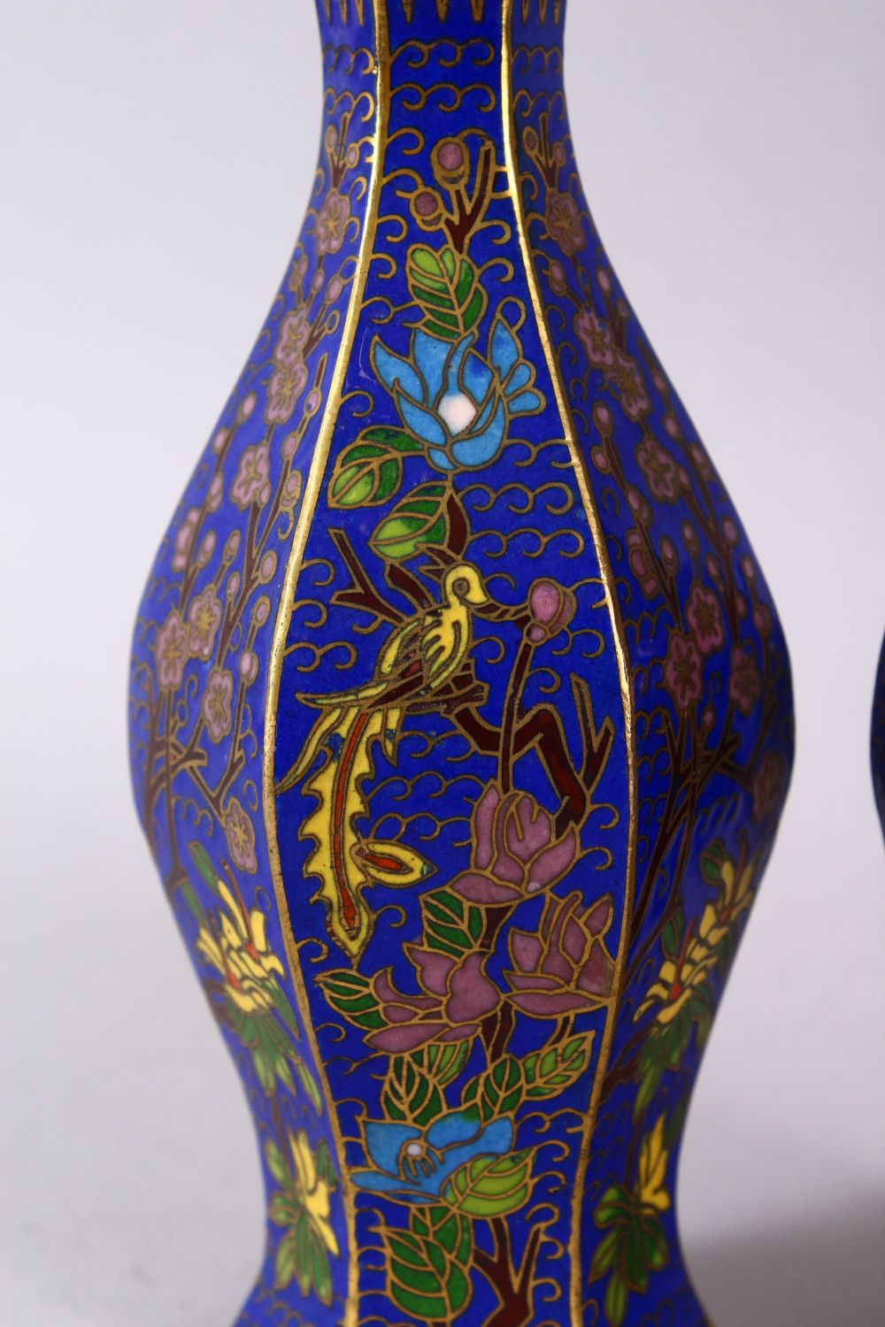 A 19TH / 20TH CENTURY CHINESE CLOISONNE VASES, with wirework depicting floral spray upon a blue - Image 2 of 6