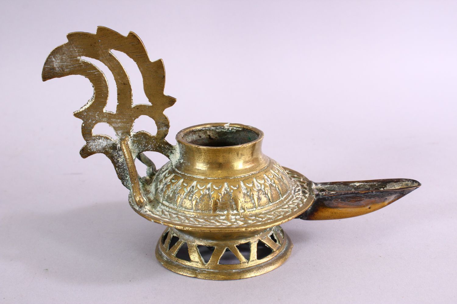 AN UNUSUAL EARLY ISLAMIC POSSIBLY ANDALUSIAN SPANISH BRASS OIL LAMP, with moulded decoration, 17cm - Image 3 of 6