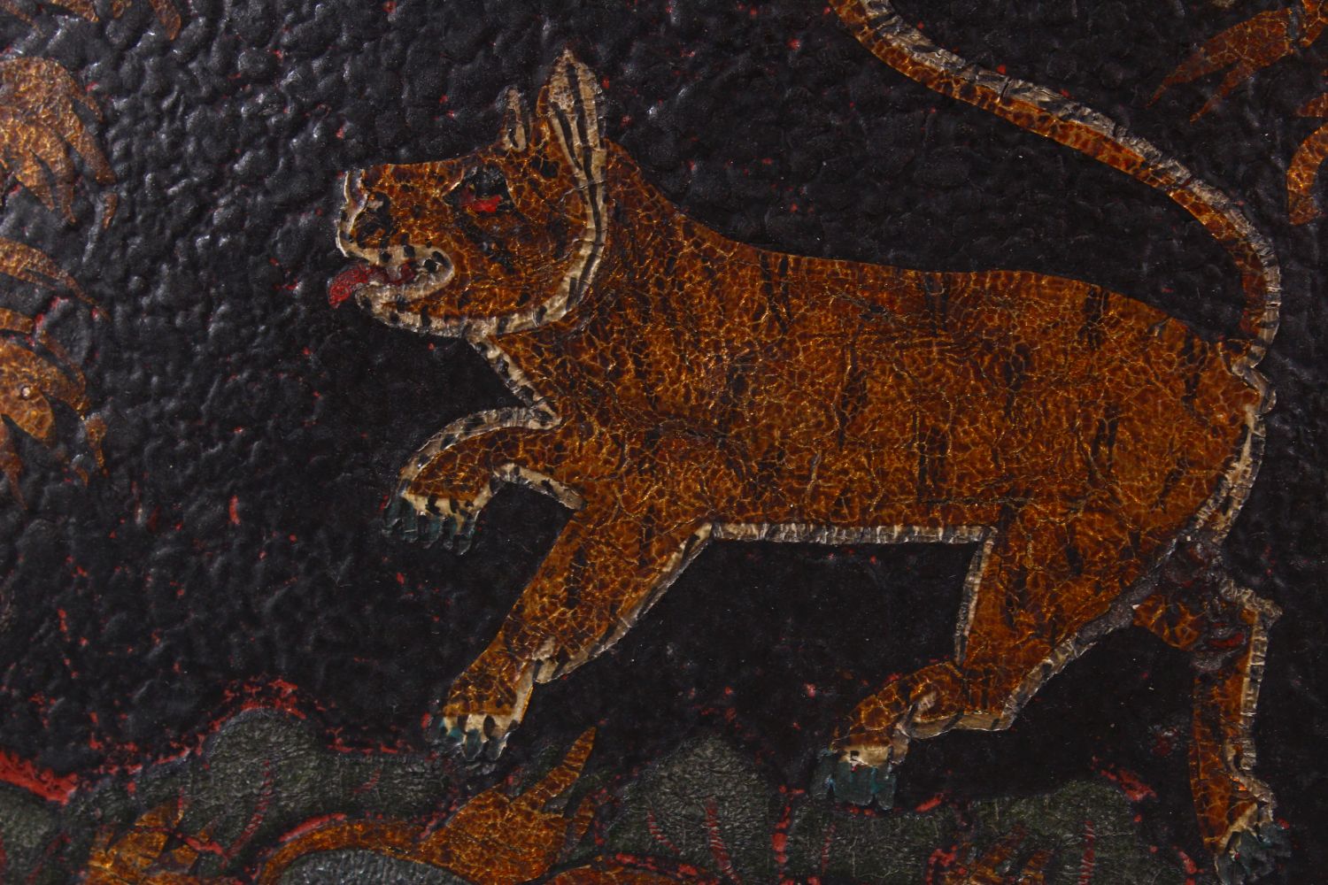 A FINE 18TH/19TH CENTURY INDIAN PAINTED LACQUER LEATHER SHIELD, decorated with a band of tigers, - Image 7 of 10