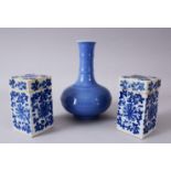 A PAIR OF CHINESE BLUE AND WHITE SQUARE FORM PORCELAIN CANISTERS AND COVERS, each box decorated with