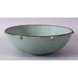 A CHINESE RU WARE STUD POTTERY BOWL / DISH, with a ribbed sectional body and raised boss stud, the