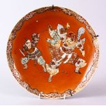 A JAPANESE MEIJI PERIOD SATSUMA DISH, decorated with three warriors in raised enamel, 31.5cm