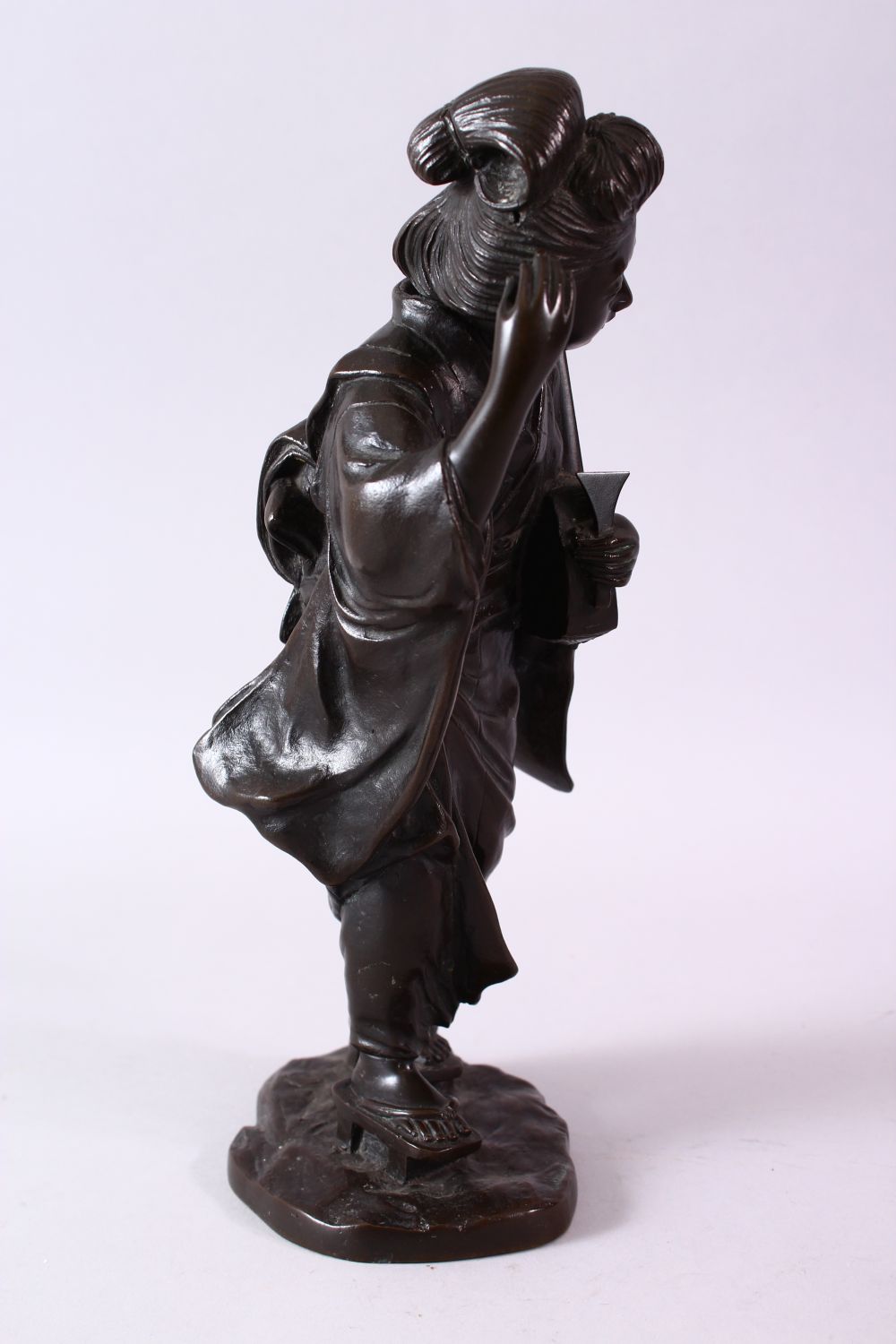 A 19TH CENTURY JAPANESE BRONZE FIGURE OF A GIRL HOLDING A MUSICAL INSTRUMENT, 32cm high. - Image 4 of 9