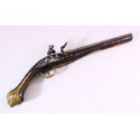 AN 18TH CENTURY ANGLO INDIAN FLINTLOCK PISTOL, with engraved lockplate, carved stock and ornate