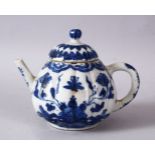 A 19TH / 20TH CENTURY CHINESE BLUE & WHITE PORCELAIN TEAPOT, decorated with f lotus display, and