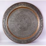 A MONUMENTAL INDIAN ENGRAVED METAL TRAY, with pierced border, 98cm diameter.
