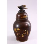 A JAPANESE MEIJI PERIOD BRONZE & MIXED METAL VASE & COVER, the body of the vase with mixed metal