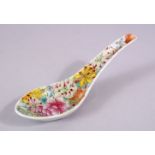A CHINESE FAMILLE ROSE SPOON, 15cm long.