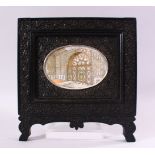 A GOOD LATE 19TH CENTURY INDIAN OVAL MINIATURE PAINTING ON IVORY depicting an architectural interior