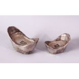 TWO PIECES OF CHINESE WHITE METAL POSSIBLY SILVER SHOE CURRENCY, 7cm and 6.5cm.