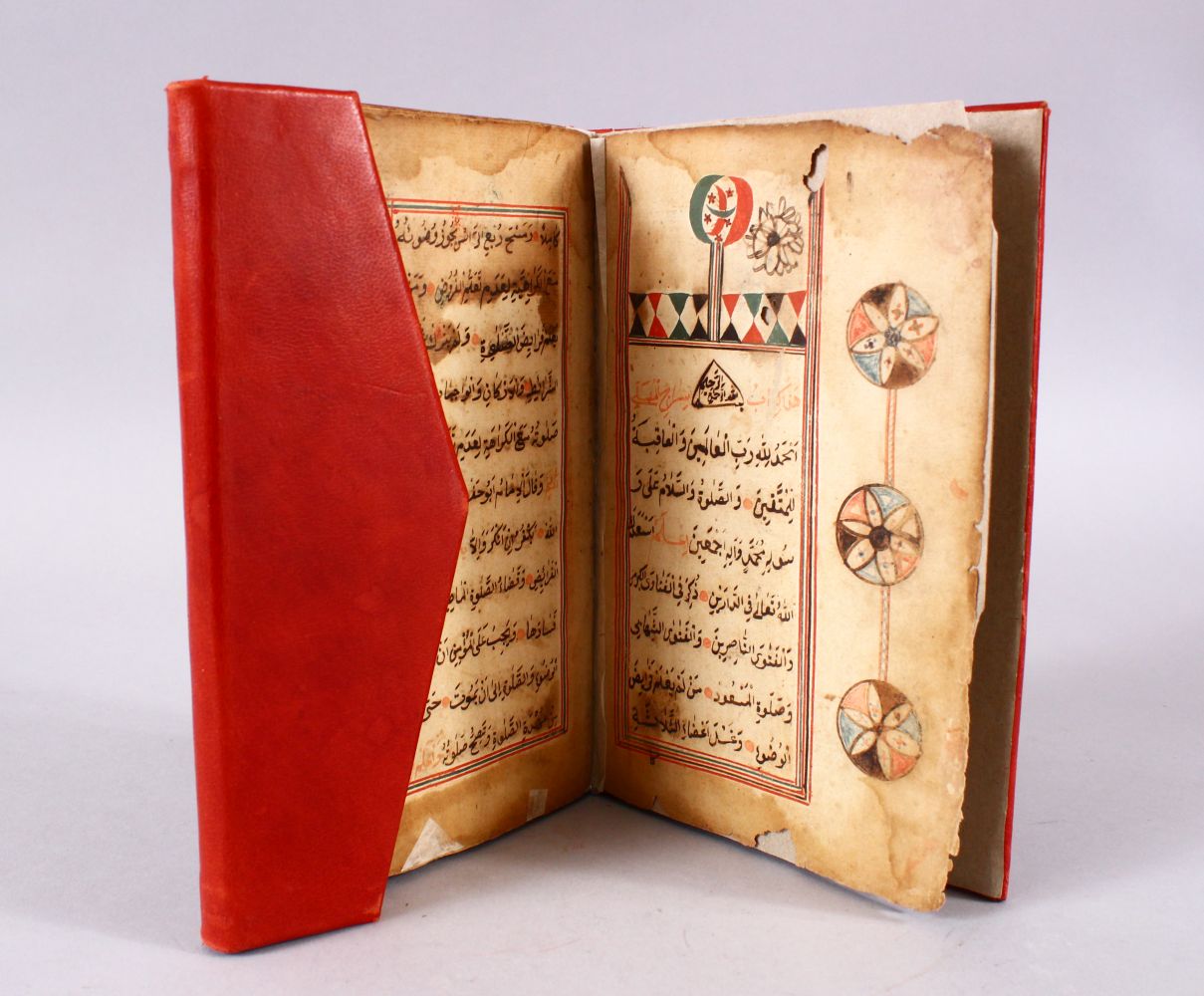 AN ISLAMIC PRAYER BOOK, with later red Morocco binding.