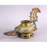 AN UNUSUAL EARLY ISLAMIC POSSIBLY ANDALUSIAN SPANISH BRASS OIL LAMP, with moulded decoration, 17cm