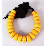 A LARGE SET OF TURKISH? PRESSED AMBER BEAD NECKLACE, 20 beads, each bead approx. 5cm, overall