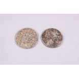 TWO EARLY SILVER ISLAMIC COINS.