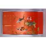 A LARGE CHINESE EMBROIDERED SILK / TEXTILE FRAMED PICTURE, of peking ducks among lotus sprays,