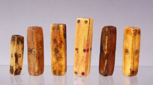 A COLLECTION OF SIX 16TH-18TH CENTURY INDIAN IVORY AND BONE GAMING DICE, the longest 8.5cm.