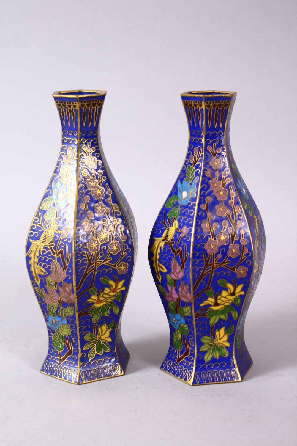 A 19TH / 20TH CENTURY CHINESE CLOISONNE VASES, with wirework depicting floral spray upon a blue - Image 3 of 6