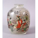 A 19TH CENTURY CHINESE REVERSE PAINTED SNUFF BOTTLE, with many figures and calligrpahy, 9cm high.