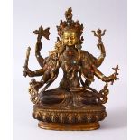 A GOOD TIBETAN GILT BRONZE FIGURE OF A MULTI ARMED DIETY, inlaid with semi precious stones, 22.5cm