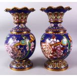 A PAIR OF 19TH/20TH CENTURY CHINESE CLOISONNE VASES, the bodies decorated with displays of native