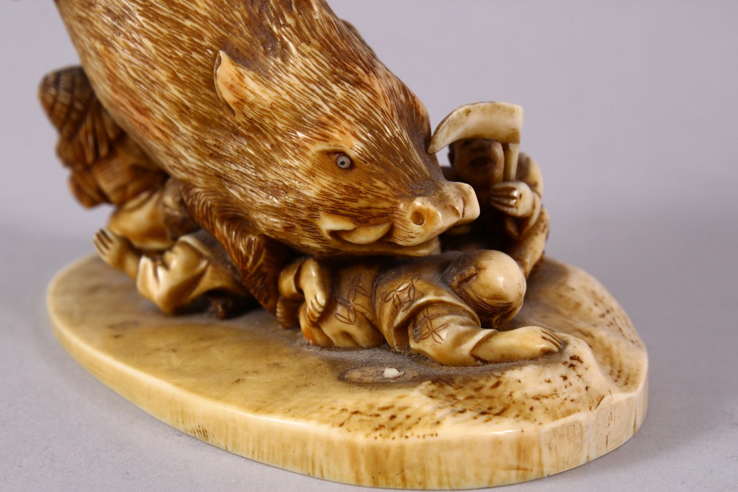 A JAPANESE MEIJI PERIOD CARVED IVORY OKIMONO GROUP- depicting a boar being attacked by numerous - Image 6 of 12