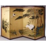 A CHINESE PAINTED SILK TEXTILE FOUR FOLD DIVIDING SCREEN, painted to depict four cranes aside a