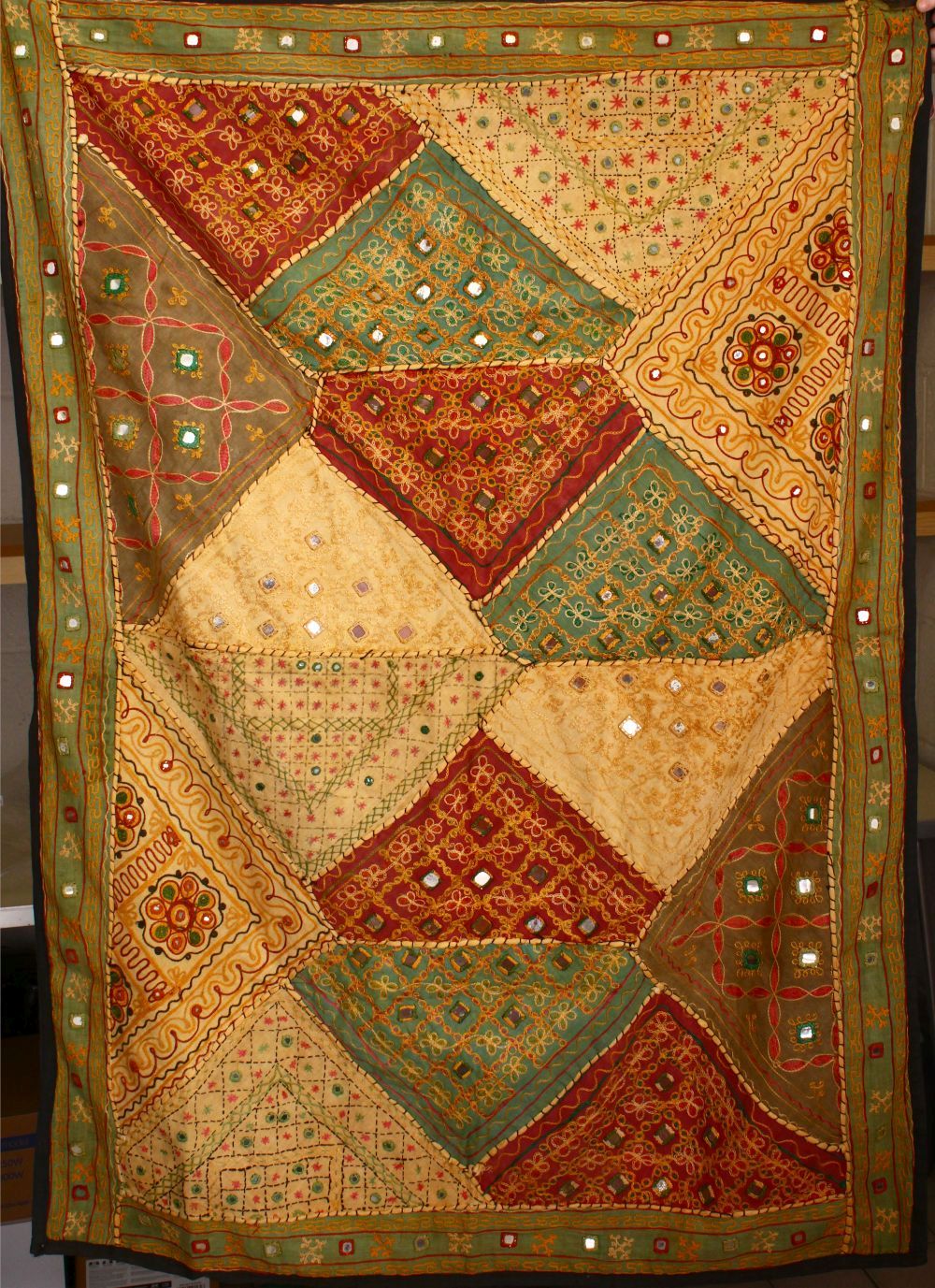 TWO ISLAMIC TEXTILES, both with stitched in mirrored sections, 150cm x 100cm and 100cm x 95cm.