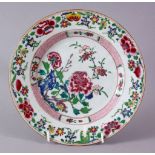 AN 18TH CHINESE FAMILLE ROSE PLATE, painted with flowers.