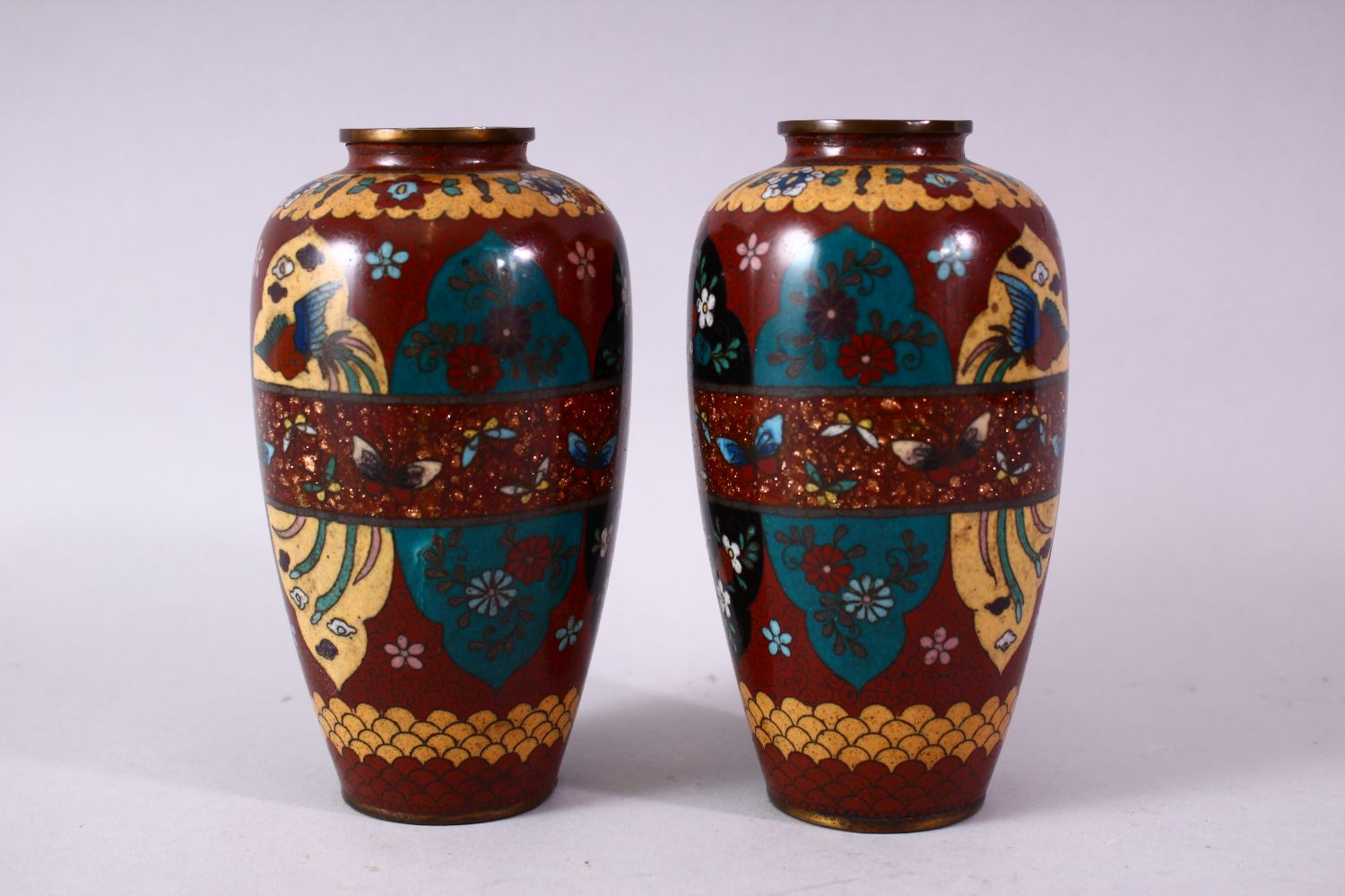A PAIR 20TH CENTURY JAPANESE CLOISONNE VASES, red ground with panels of birds and flowers, 15cm - Image 5 of 8