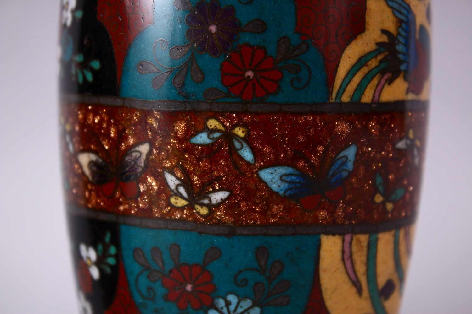 A PAIR 20TH CENTURY JAPANESE CLOISONNE VASES, red ground with panels of birds and flowers, 15cm - Image 6 of 8