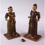 TWO PERSIAN LACQUERED WOOD FIGURES, (AF), 18.5cm high.