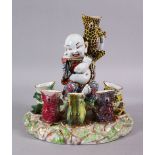 A CHINESE REPUBLIC STYLE PORCELAIN FLOWER / EGG HOLDER OF BUDDHA AND FROGS, the frogs seated with