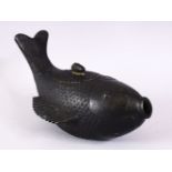 A CHINESE BRONZE CARP FORMED TEA POT, in the form of a flipping fish, with a cover and small carp