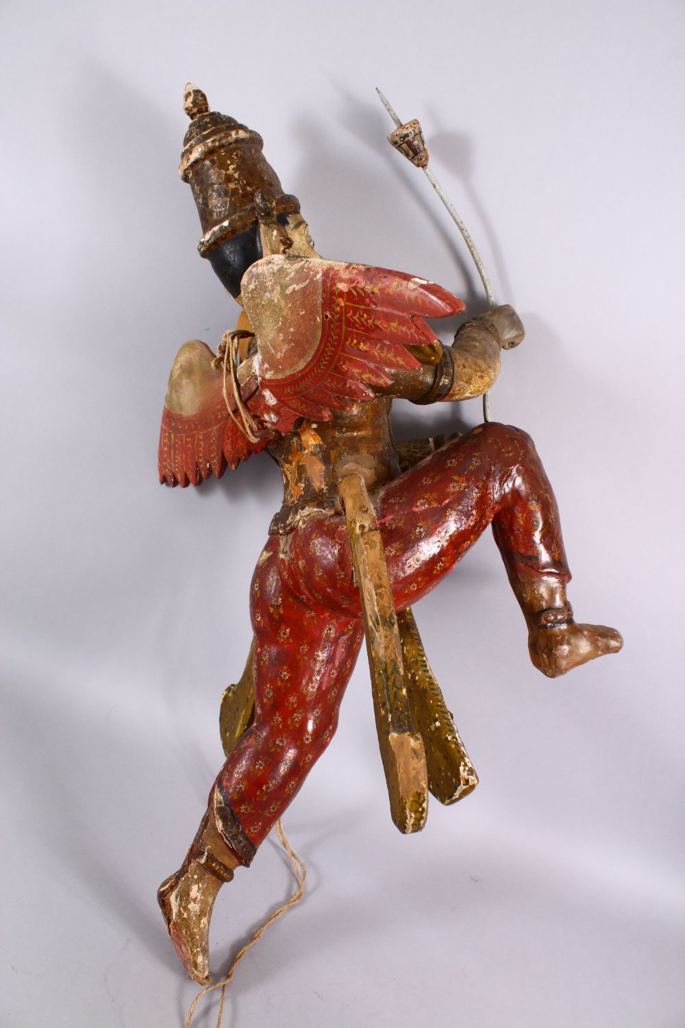 A 19TH CENTURY INDIAN / BURMESE CARVED WOOD FIGURE OF A WINGED GOD, stood holding an implement, with - Image 5 of 5