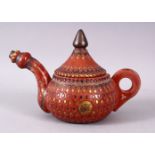 A 19TH CENTURY TURKISH TOPHANE POTTERY COFFEE POT, with carved droplet motif decoration, and