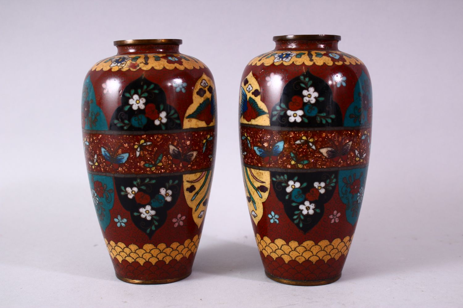A PAIR 20TH CENTURY JAPANESE CLOISONNE VASES, red ground with panels of birds and flowers, 15cm - Image 4 of 8