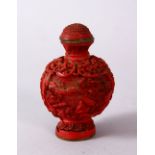 A 19TH / 20TH CENTURY CHINESE CINNABAR LACQUER SNUFF BOTTLE, The body carved depicting figures in