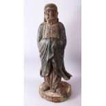 A 18TH/19TH CENTURY CHINESE CARVED WOOD FIGURE OF ROHAN, on a shaped base, 90cm high.