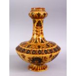 AN ISLAMIC POTTERY VASE, with bands of floral decoration, 25cm high.