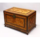 A GOOD 20TH CENTURY CHINESE CARVED CAMPHORWOOD CHEST, the top and sides well carved with figures