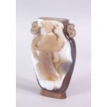 A 19TH / 20TH CENTURY CHINESE CARVED AGATE OVERLAID VASE - GUANYIN, the vase depicting and