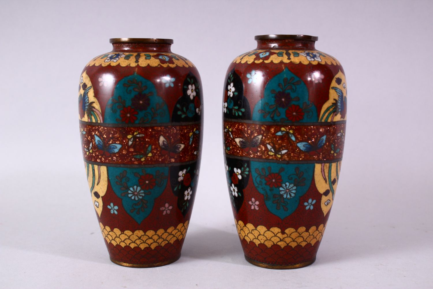 A PAIR 20TH CENTURY JAPANESE CLOISONNE VASES, red ground with panels of birds and flowers, 15cm - Image 3 of 8