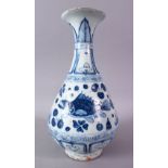 A CHINESE YUAN STYLE BLUE & WHITE PORCELAIN FISH VASE, decorated with two fish swimming amongst