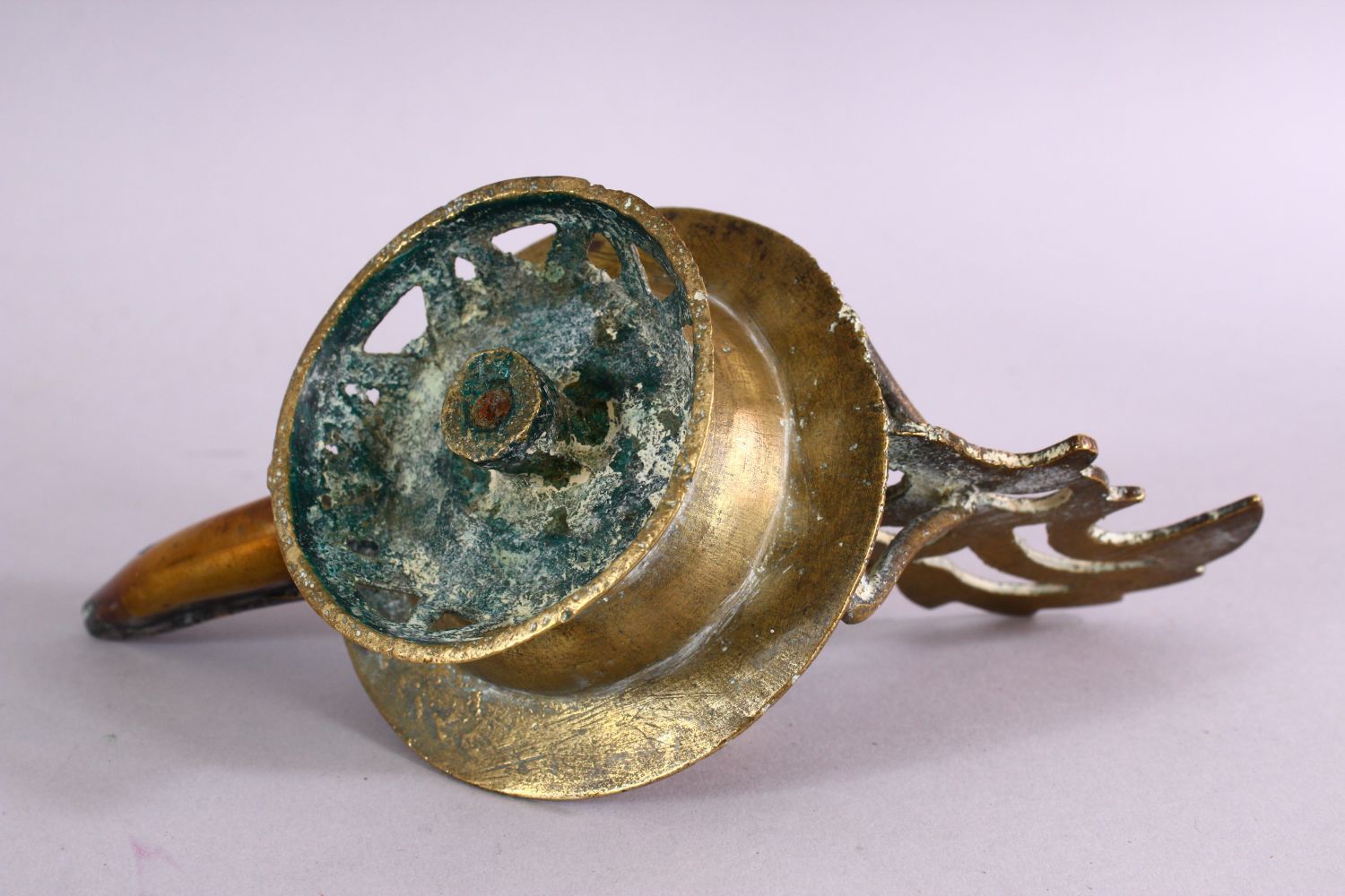 AN UNUSUAL EARLY ISLAMIC POSSIBLY ANDALUSIAN SPANISH BRASS OIL LAMP, with moulded decoration, 17cm - Image 6 of 6