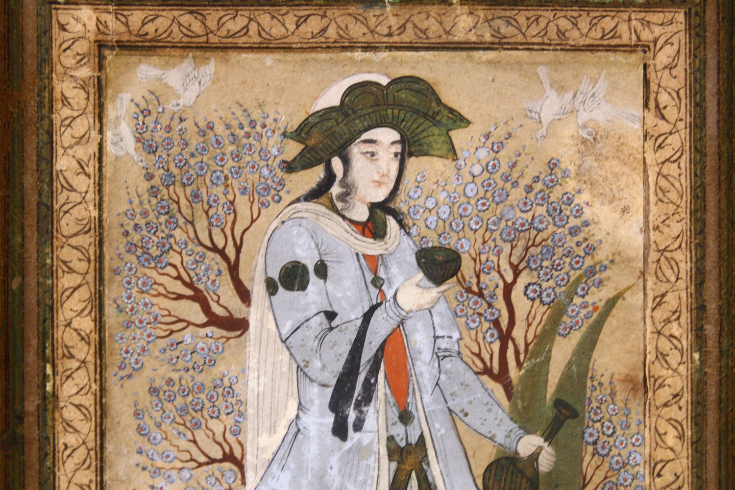 A SAFAVID MINIATURE PAINTING OF A PRINCE in a garden setting, 14cm x 9.5cm. - Image 2 of 3