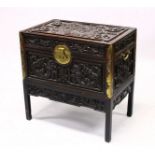 A GOOD 19TH CENTURY CHINESE CARVED HARDWOOD / HONGMU DRAGON CARVED LIDDED CHEST, the panels of the