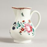 AN 18TH CENTURY LIVERPOOL SPARROW BEAK JUG painted with coloured flowers.