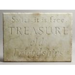 AN ITALIAN CARVED WHITE MARBLE PLAQUE, carved 'Smile It Is Free, TREASURE Old Friendships'. 13ins