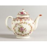 AN 18TH CENTURY LOWESTOFT TEAPOT AND COVER painted with a Curtis type pattern. (AF)