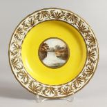 AN 18TH CENTURY DERBY PLATE with a yellow ground painted with a landscape of the Fall of Fire near